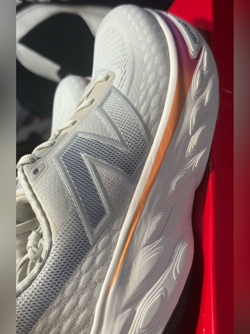 New Balance White and Orange women’s Athletic Shoe